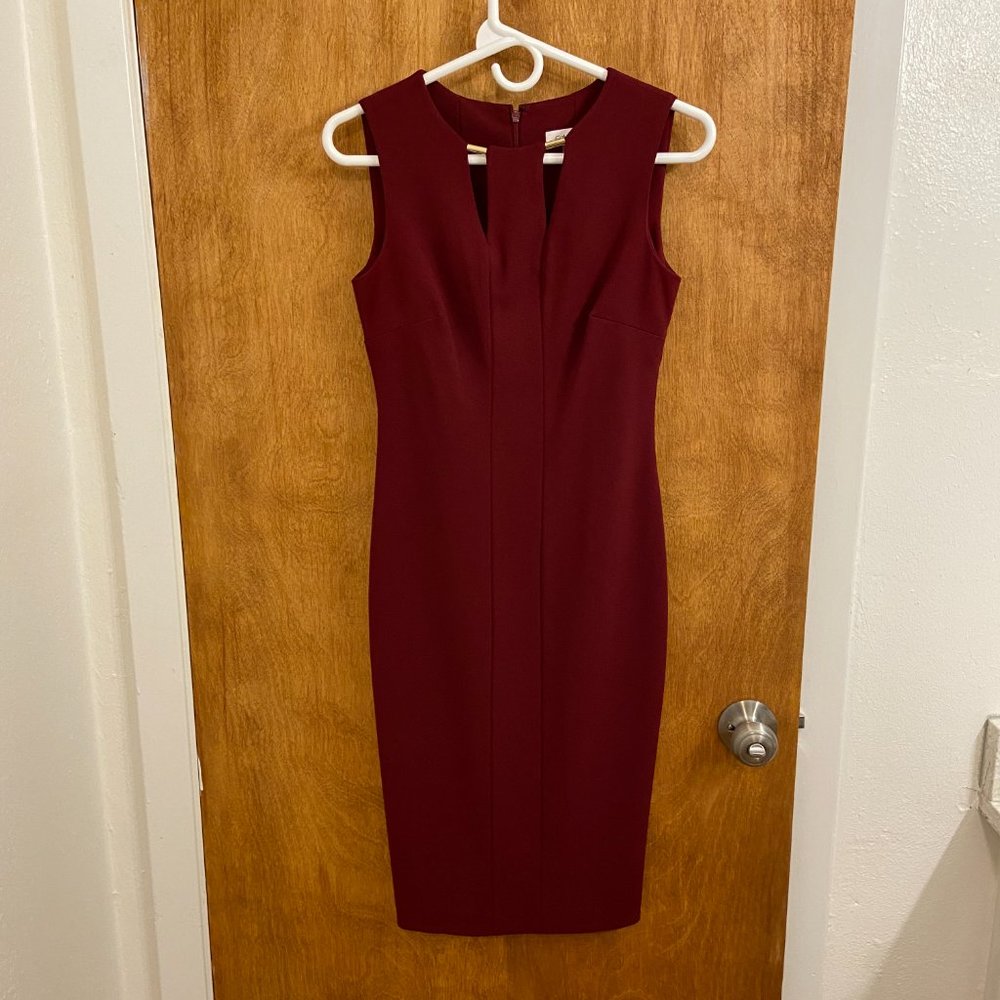 Calvin Klein burgundy sheath dress with metal neckline detail, size 0, like new